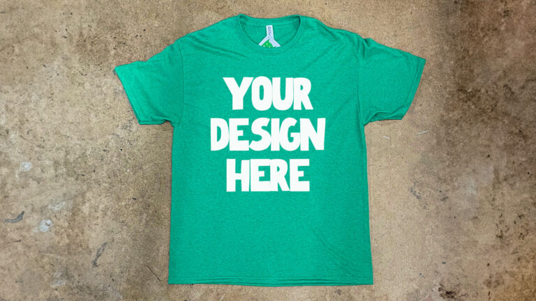 green shirt that says 'your design here'